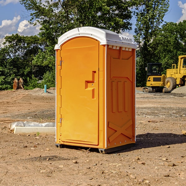 how often are the portable restrooms cleaned and serviced during a rental period in Doole